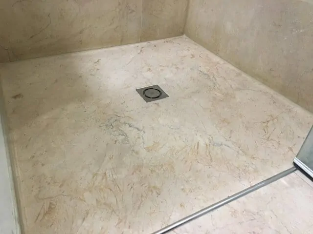 shower base limestone polishing after